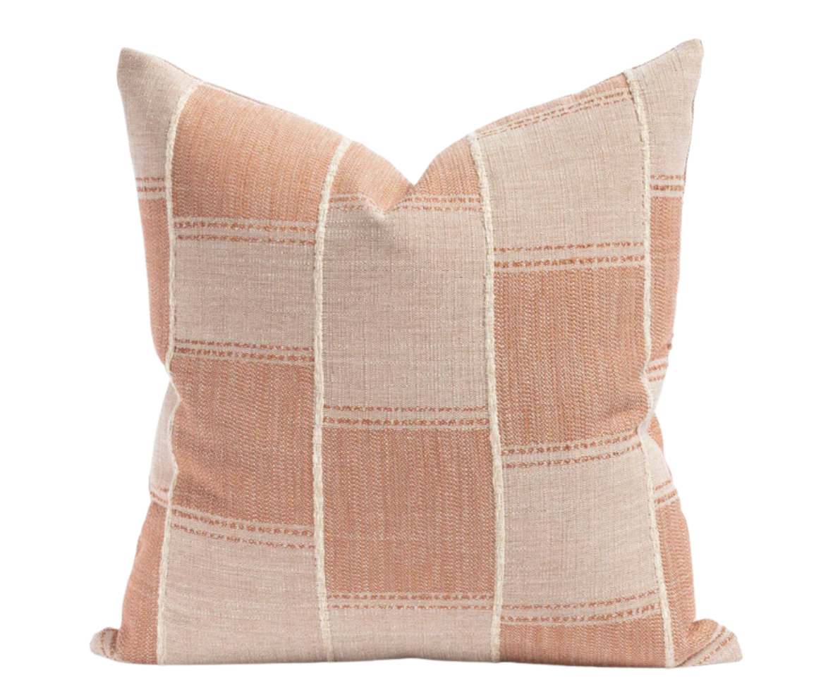  pillow has a chunky vertical stripe and tone-on-tone terracotta pattern 